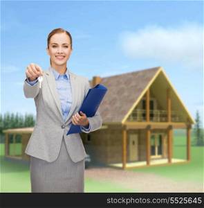 business, real estate, banking and office concept - smiling businesswoman with folder and keys