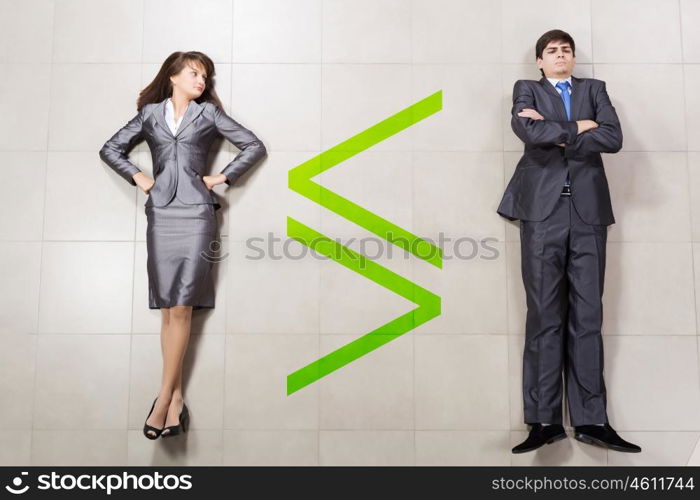 Business relations. Funny businessman and woman lying on floor. Competition concept