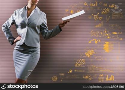 Business report. Close up of businesswoman with papers in hands