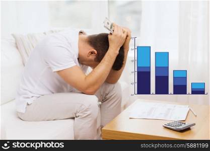 business, savings, financial crisis and people concept - upset man with money and calculator at home