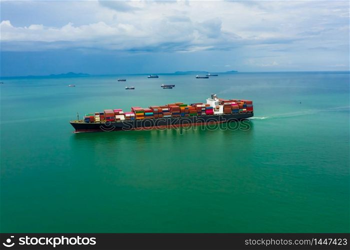 business service and industry shipping cargo containers transportation import and export international sailing on the sea aerial view from drone