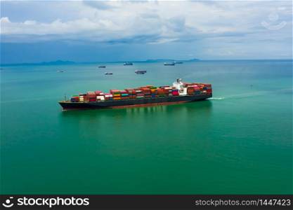business service and industry shipping cargo containers transportation import and export international sailing on the sea aerial view from drone