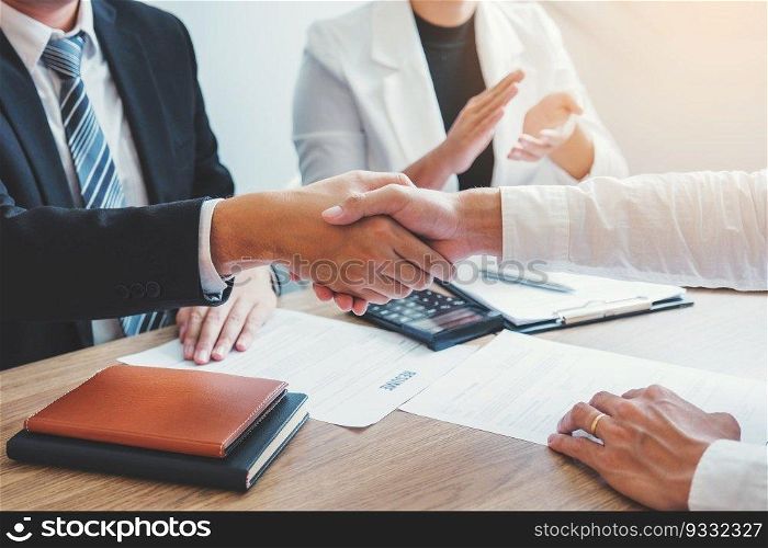 Business Shaking hands greeting new colleagues after during job interview Concept