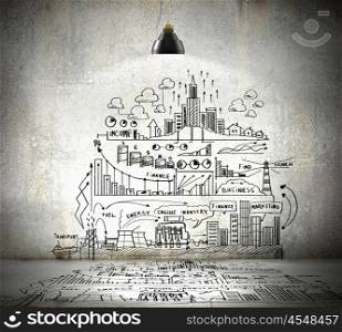 Business sketch on wall. Drawn business plan on wall illuminated by lamp above