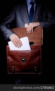 Business spy with briefcase