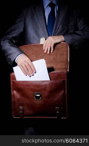 Business spy with briefcase