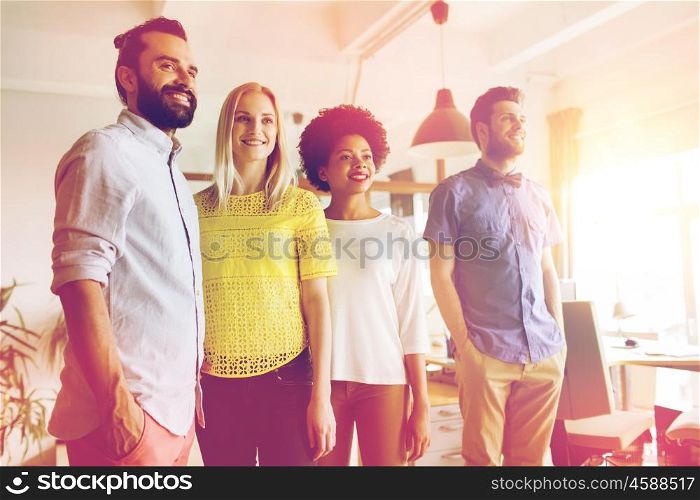 business, startup and office concept - happy business team in office