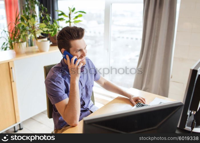 business, startup and people concept - happy businessman or creative male office worker with computer calling on smarphone