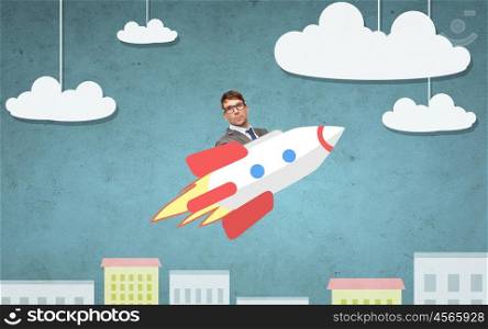 business, startup, development and people concept - businessman flying on rocket above cartoon city