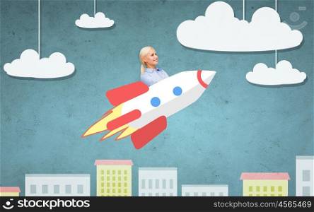 business, startup, development and people concept - businesswoman flying on rocket above cartoon city