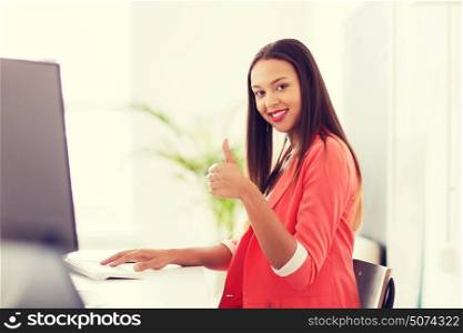 business, startup, education and people concept - happy young african woman with computer working at office and showing thumbs up. happy african woman with computer at office
