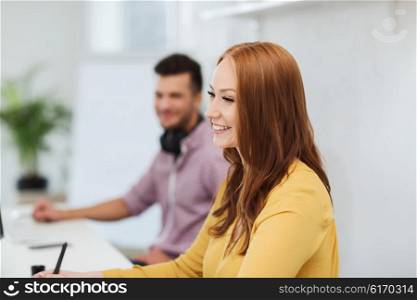business, startup, education and people concept - happy young creative redhead woman with pc computer over man or student working at office