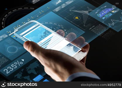 business, statistics, people and future technology concept - close up of businessman hand with charts on transparent smartphone screen and virtual projections over black background. close up of businessman with charts on smartphone