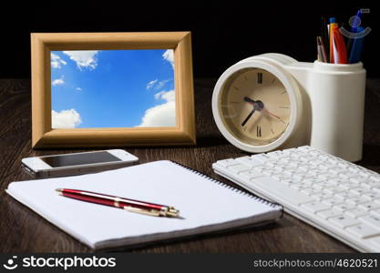 Business still life. Close up of workplace with office supplies on table