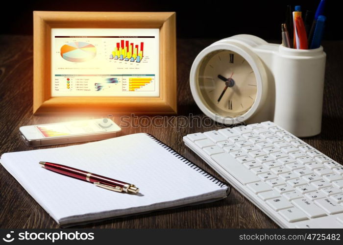 Business still life. Close up of workplace with office supplies on table