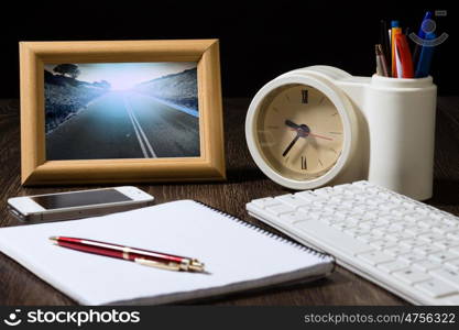 Business still life. Close up of workplace with office supplies on table