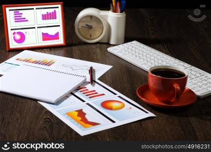 Business still life. Close up of workplace with office supplies on table