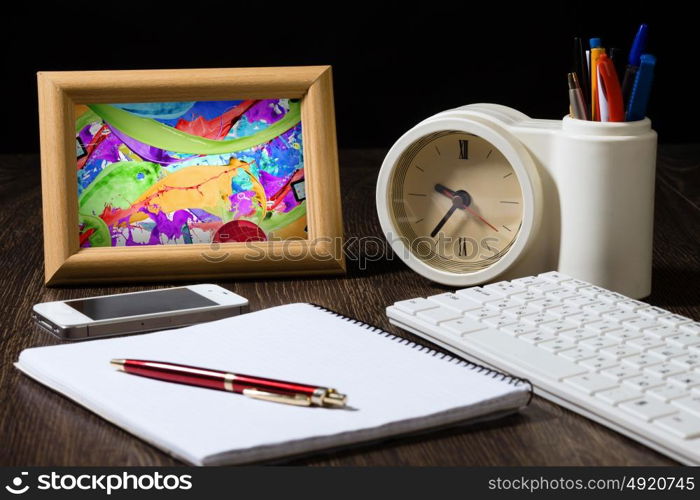 Business still life. Close up of workplace with office supplies on table