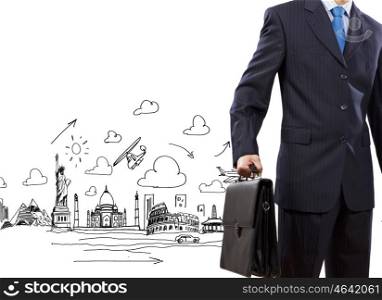 Business strategy. Businessman holding suitcase against sketch background. Business travel