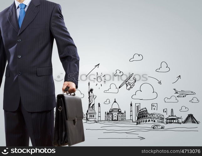 Business strategy. Businessman holding suitcase against sketch background. Business travel