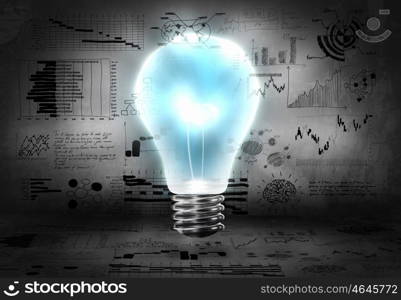 Business strategy. Conceptual image with light bulb and business sketches