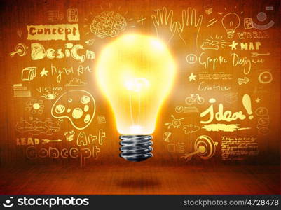 Business strategy. Conceptual image with light bulb and business sketches