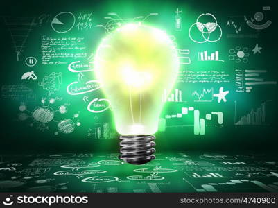 Business strategy. Conceptual image with light bulb and business sketches