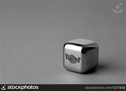 Business & strategy icon on metal cube for futuristic style