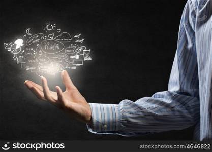 Business strategy in hand. Businessman hand presenting business idea sketch on palm
