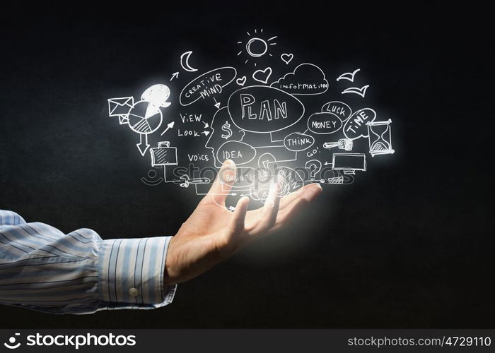 Business strategy in hand. Businessman hand presenting business idea sketch on palm