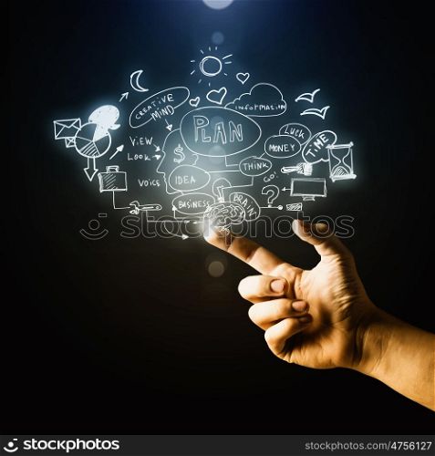Business strategy. Male hand pointing with finger at business plan on screen