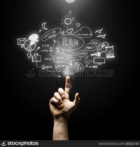 Business strategy. Male hand pointing with finger at business plan on screen