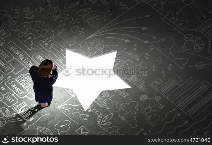 Business strategy. Top view of businesswoman looking at business sketches