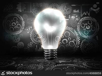 Business structure. Background image with light bulb and cogwheels