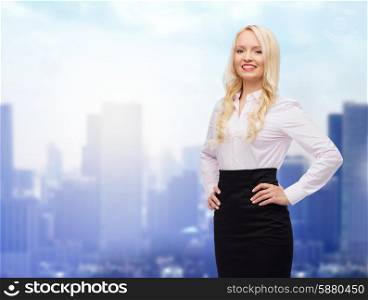 business, style and people concept - smiling businesswoman over city background