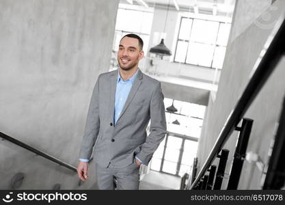 business, success and career lift concept - businessman walking upstairs. businessman walking upstairs. businessman walking upstairs