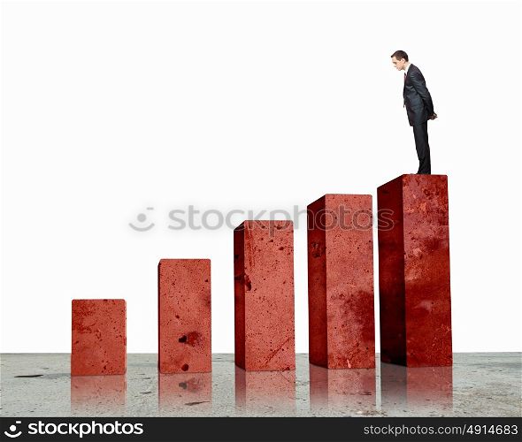 Business Success. Business person on a graph, representing success and growth