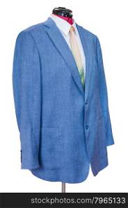 business suit on tailor mannequin - blue silk jacket with shirt and tie isolated on white background
