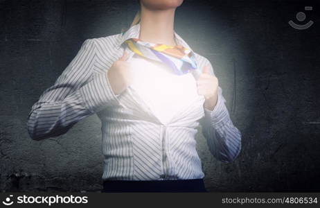 Business super power. Unrecognizable businesswoman opening her shirt like superhero