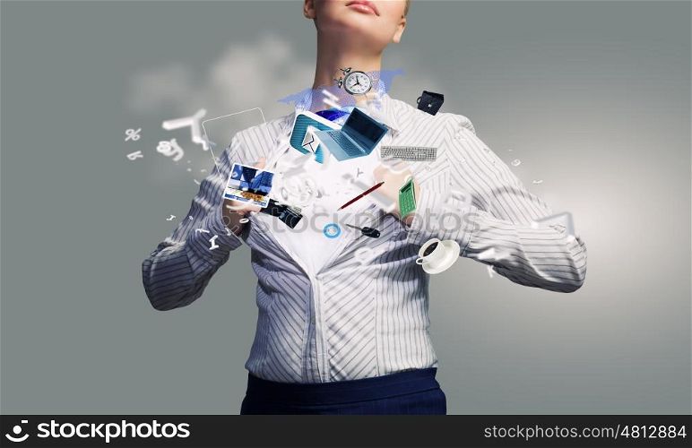 Business super power. Young attractive businesswoman opening her shirt like superhero