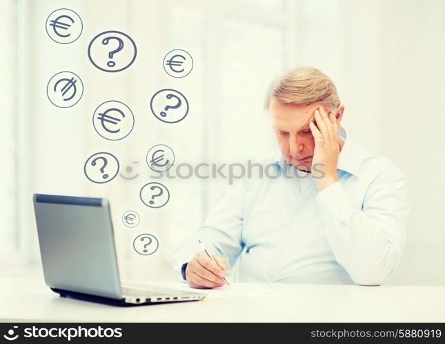 business, tax, office, school and education concept - old man filling a form at home