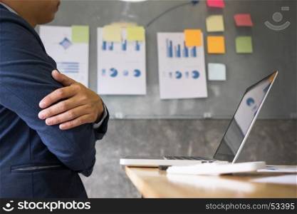 Business team analyzing income charts and strategy graphs documents on office table with digital tablet and graph financial with social network diagram and man working in the office background.