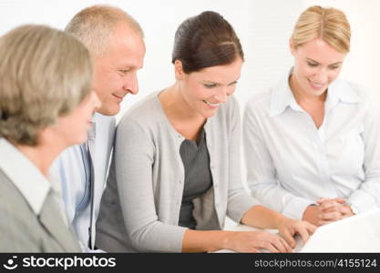 Business team attractive businesswomen with happy colleagues working around table