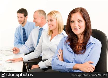 Business team attractive woman sit in line behind computer table