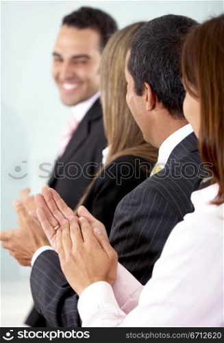 business team clapping a good presentation