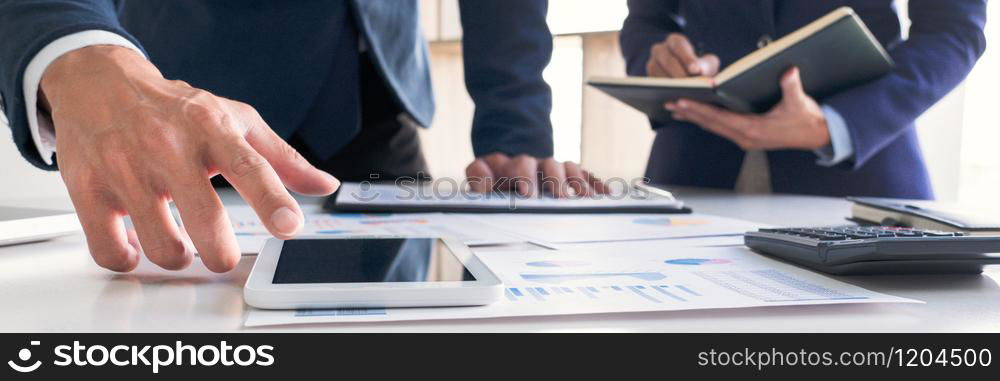 Business team colleague working together in the office with plan on desk, Talking Discussing Concept