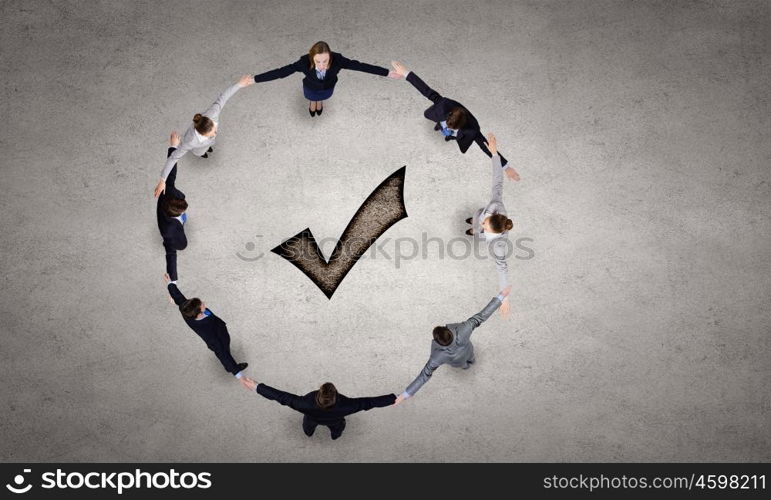 Business team. Group of business people standing in circle