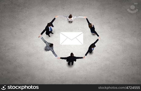 Business team. Group of business people standing in circle