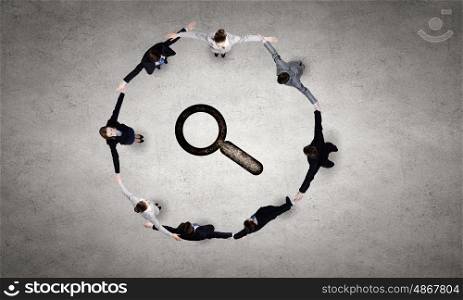 Business team. Group of business people standing in circle