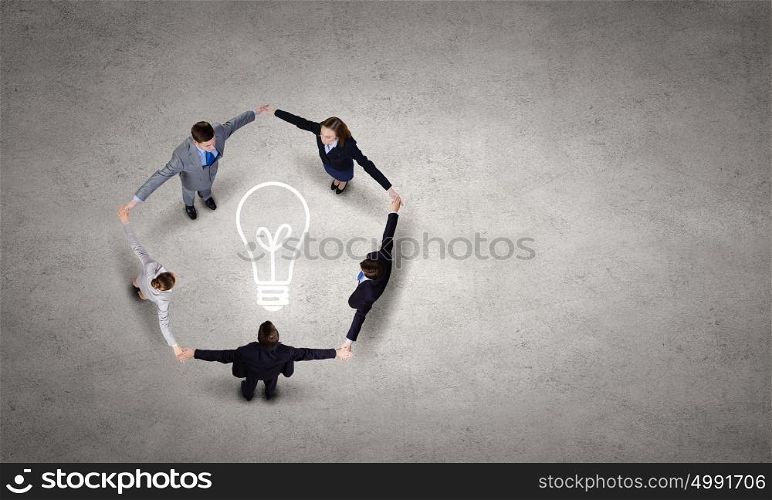 Business team. Group of business people standing in circle